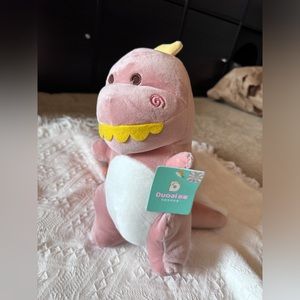 Plush pink dinosaur